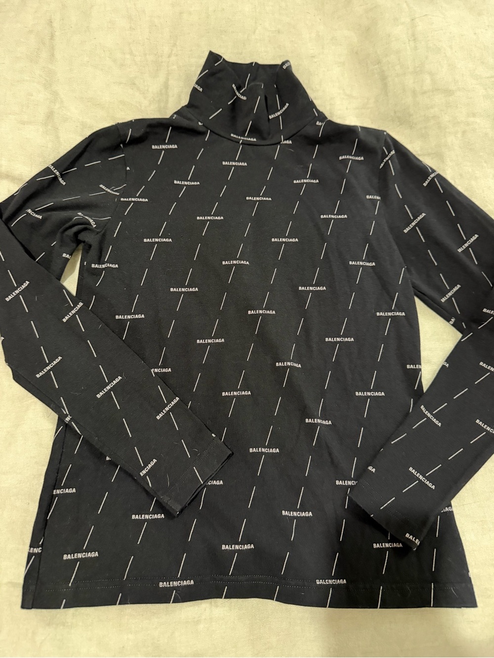 Balenciaga Black Turtleneck Sweater with White Diagonal Logo Print
